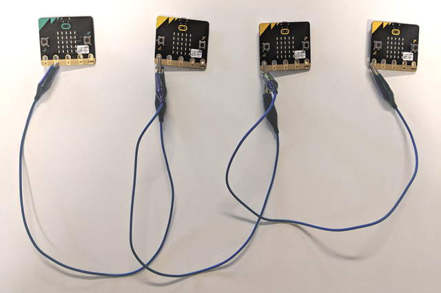 Image of micro:bits connected via a daisy chain