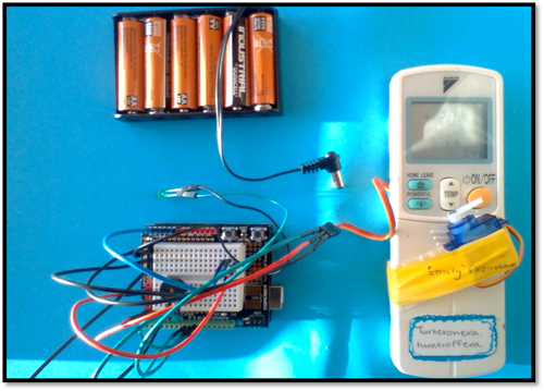 Image of hot bot hardware including a circuit, remote and battery pack