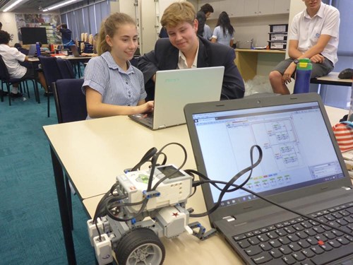 Image of students on laptop