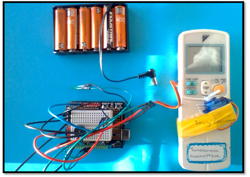 Image of hot bot hardware including a circuit, remote and battery pack.