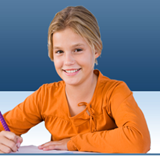 Girl in orange shirt holding pen and smiling at camera